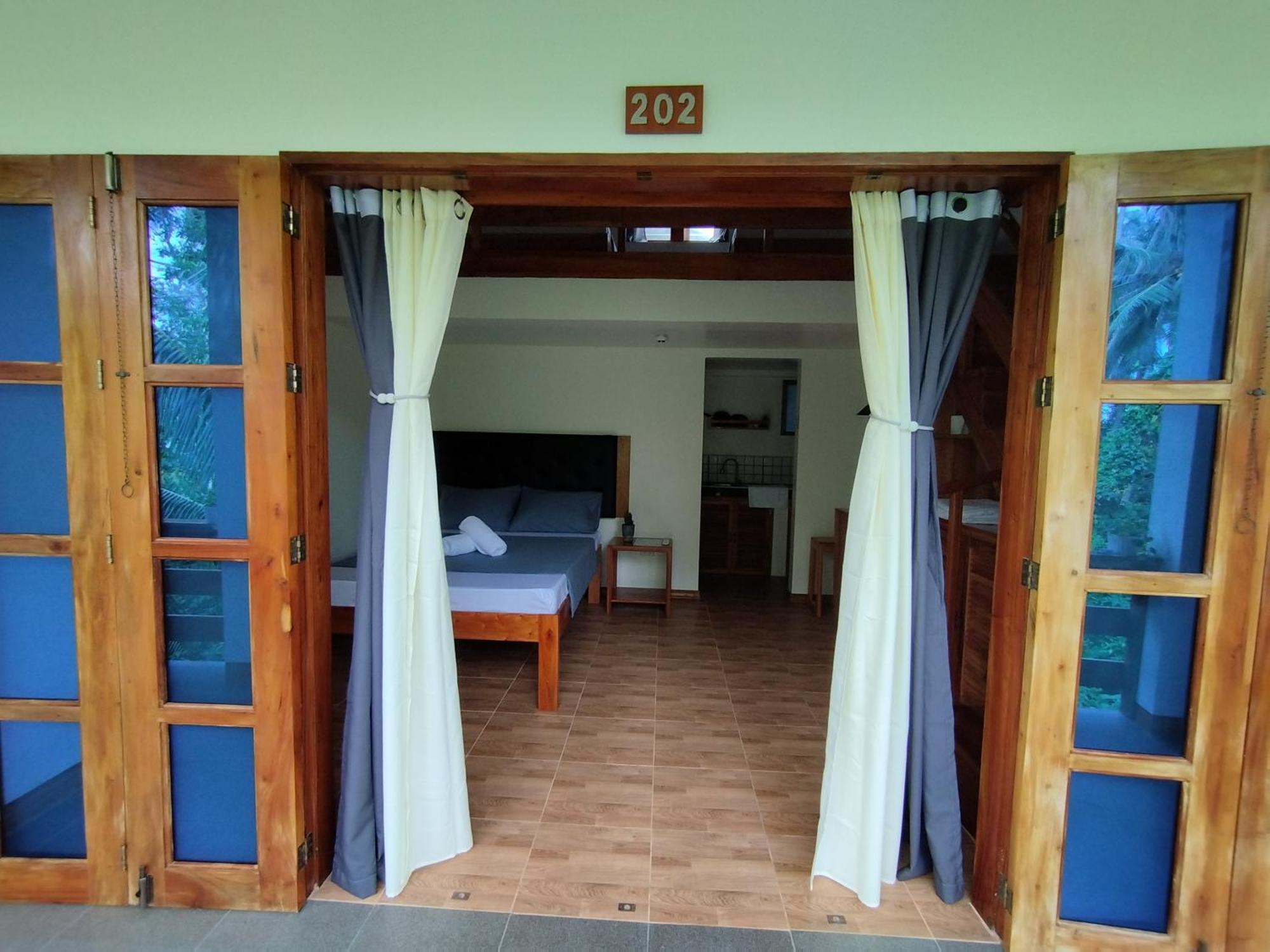 White Bada Guesthouse Siquijor Quarto foto